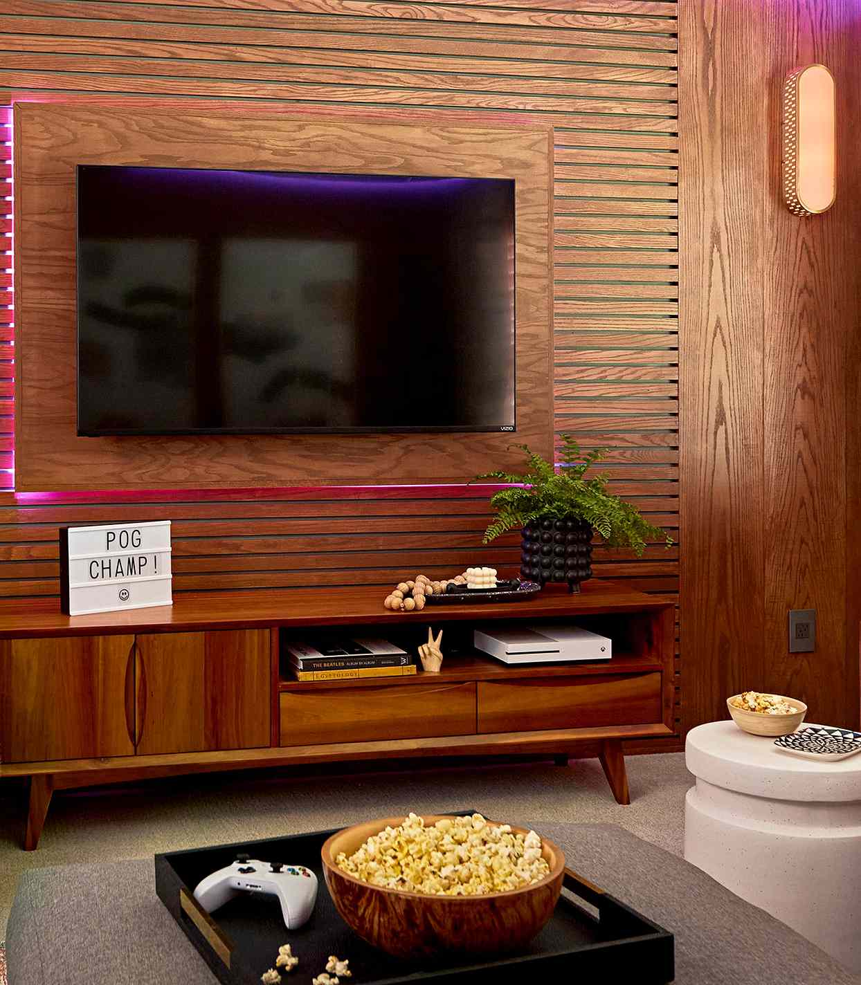 wood panel television wall-mount game room back lighting popcorn