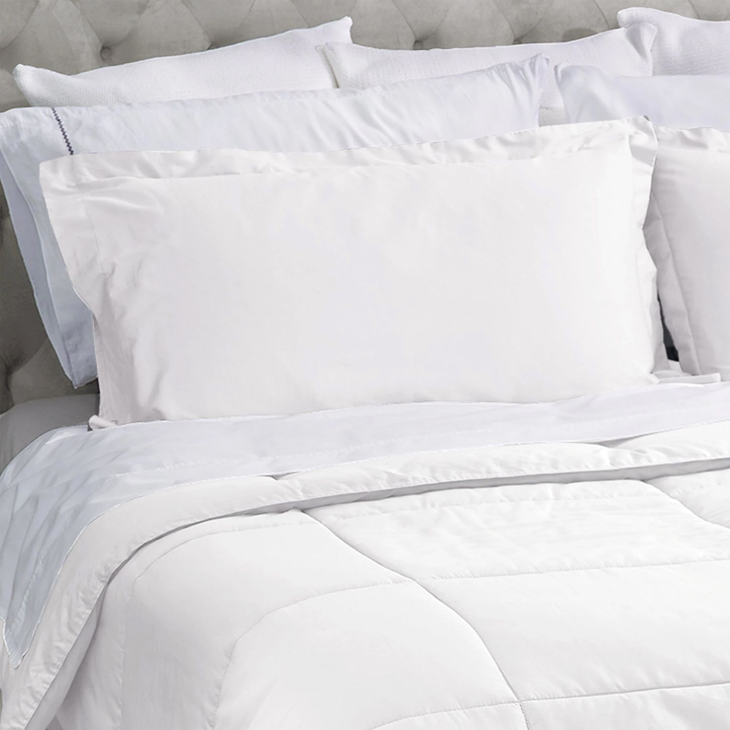 covermade bedding on bed in white