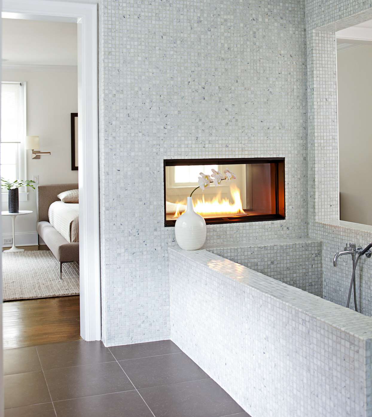 marble tiled fireplace bathtub