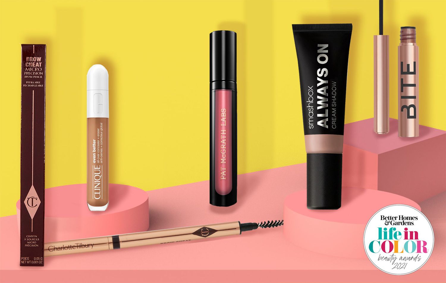 makeup products on pink and yellow background