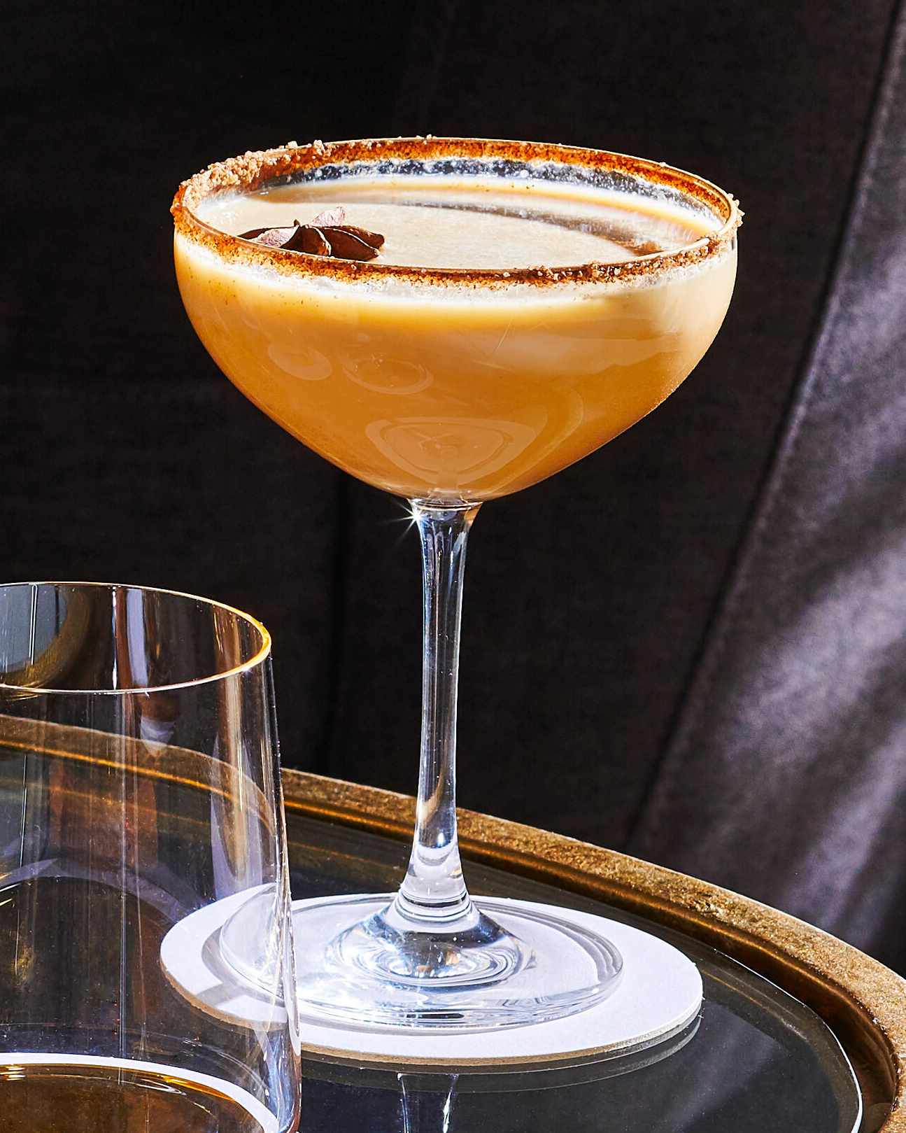 Pumpkin Brandy Alexander cocktail in short coupe glass