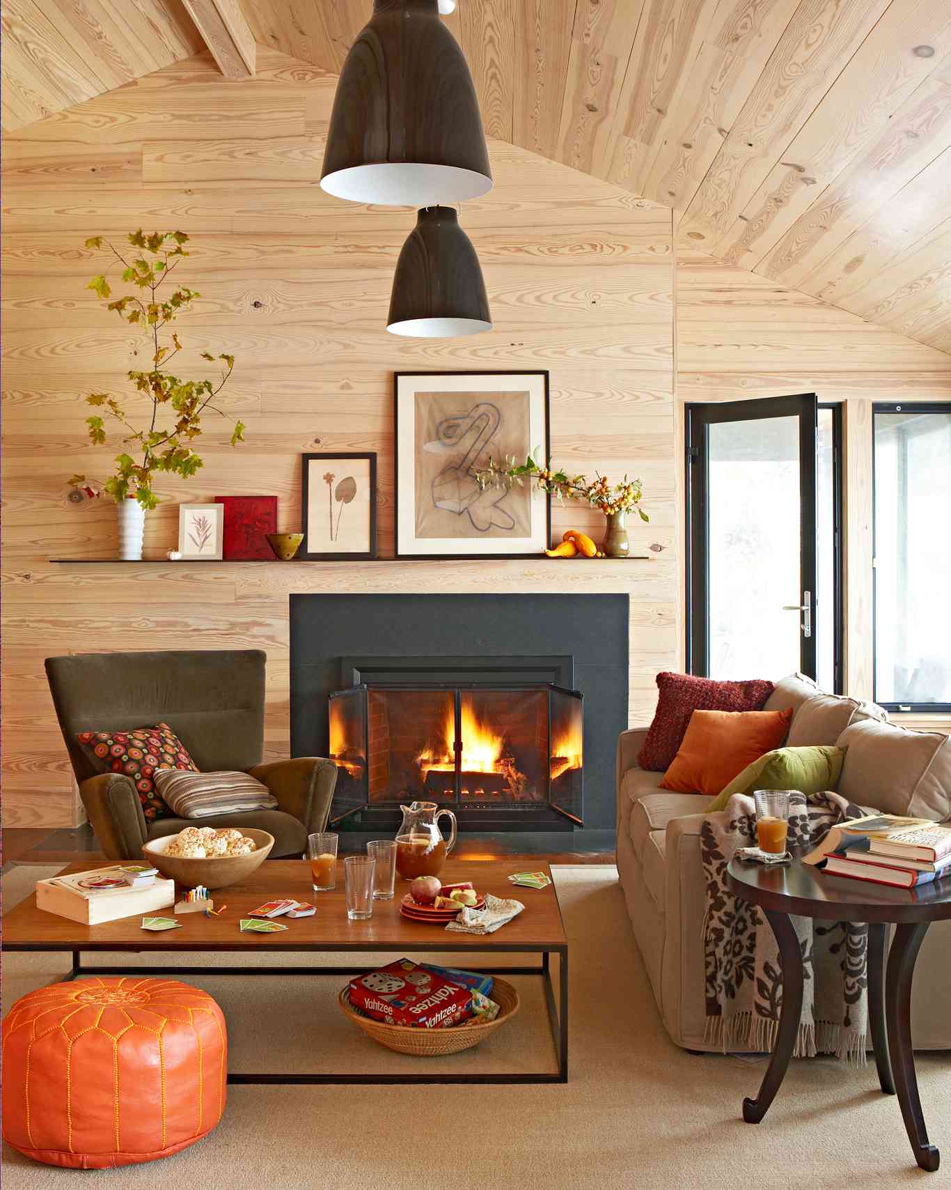 wood wall living room with fireplace