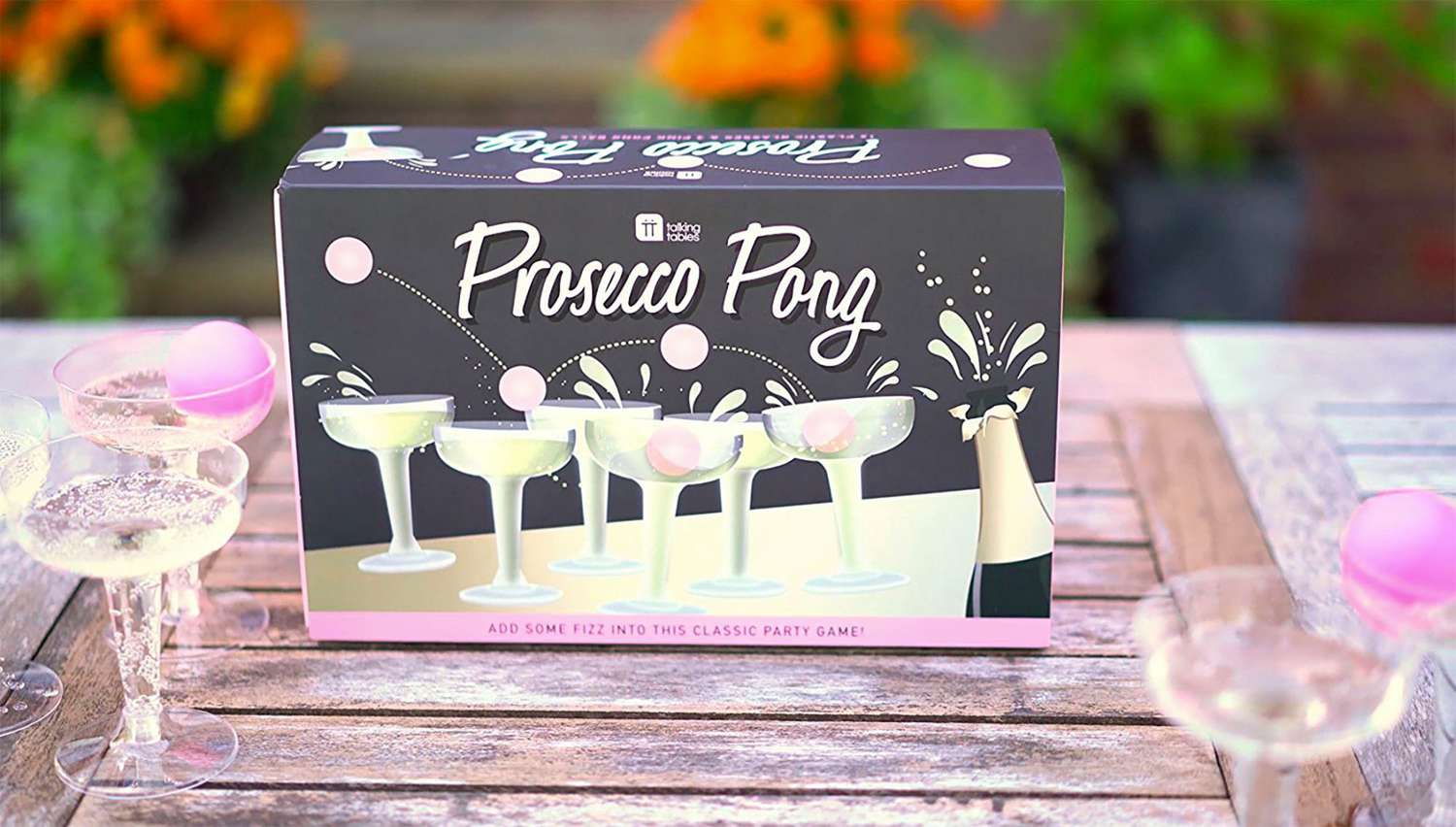 prosecco pong party game set on outdoor table
