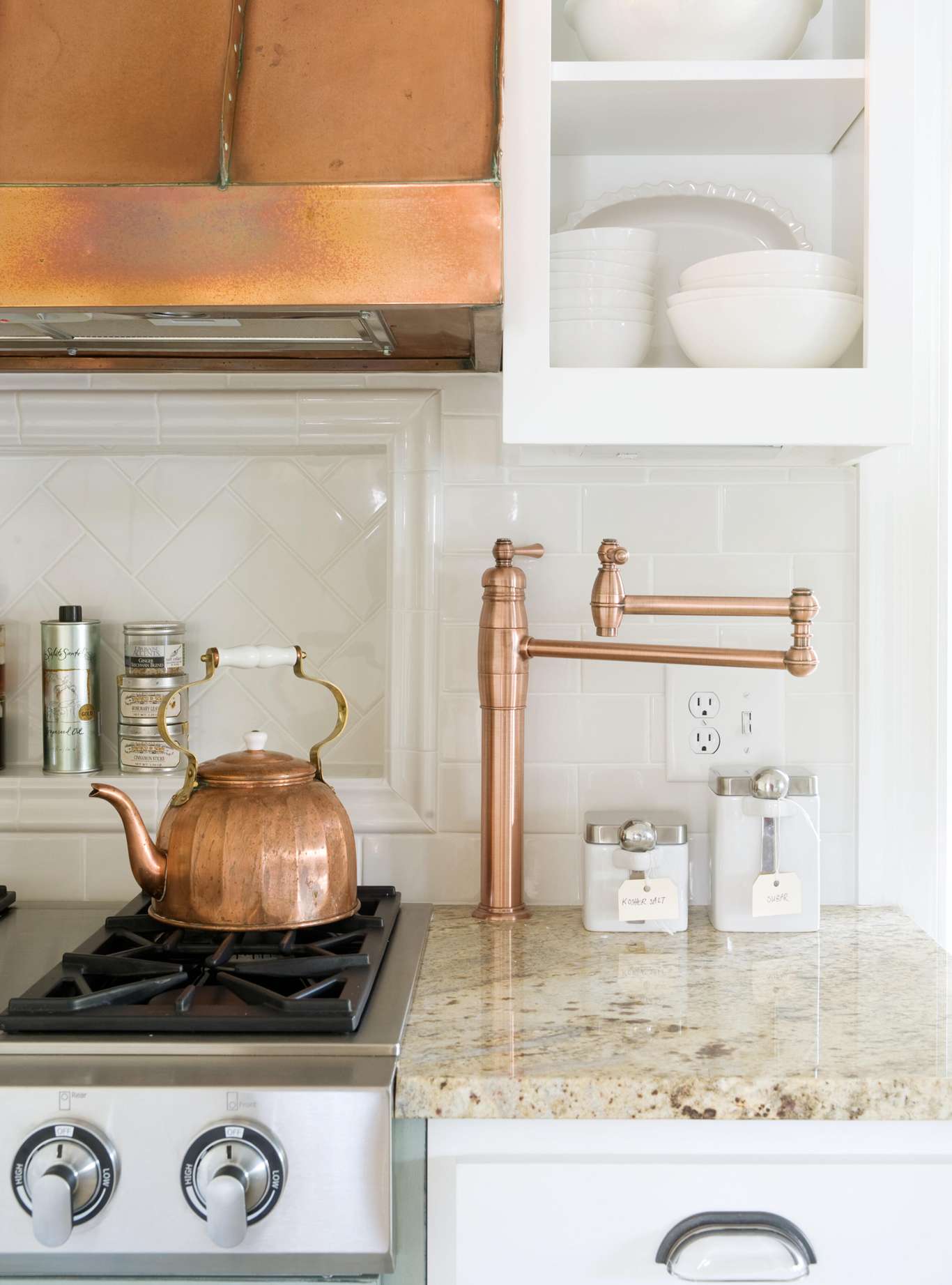 kitchen's copper features Granite Countertop