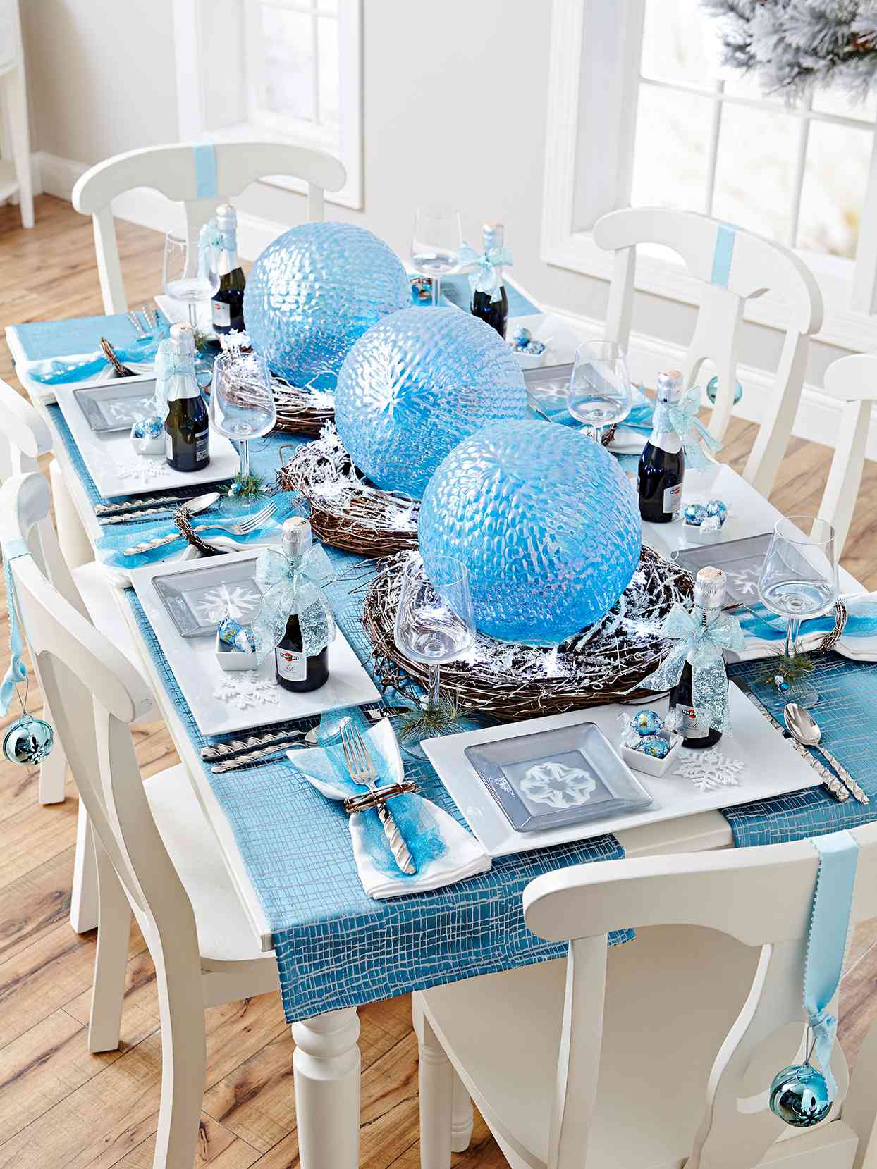 blue glass globes silver white new years table ornaments snowflakes ribbon tulle