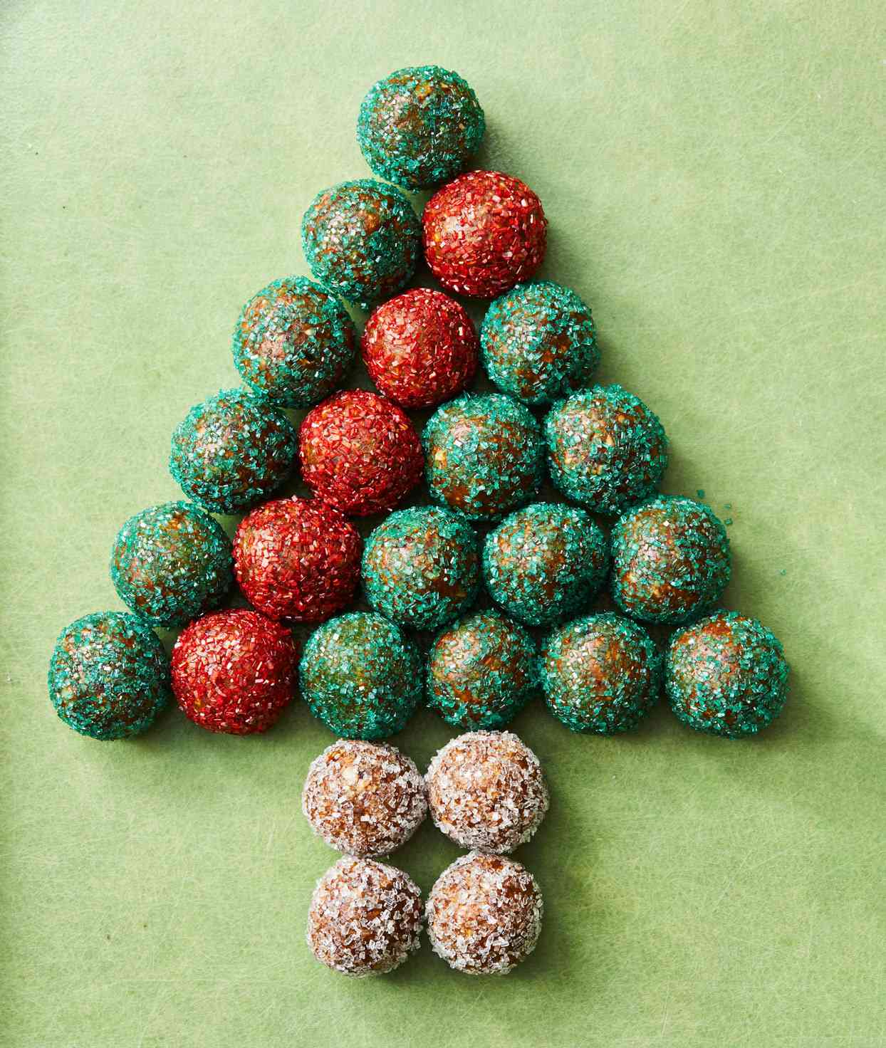 red and green sugar-coated cookies in shape of Christmas tree
