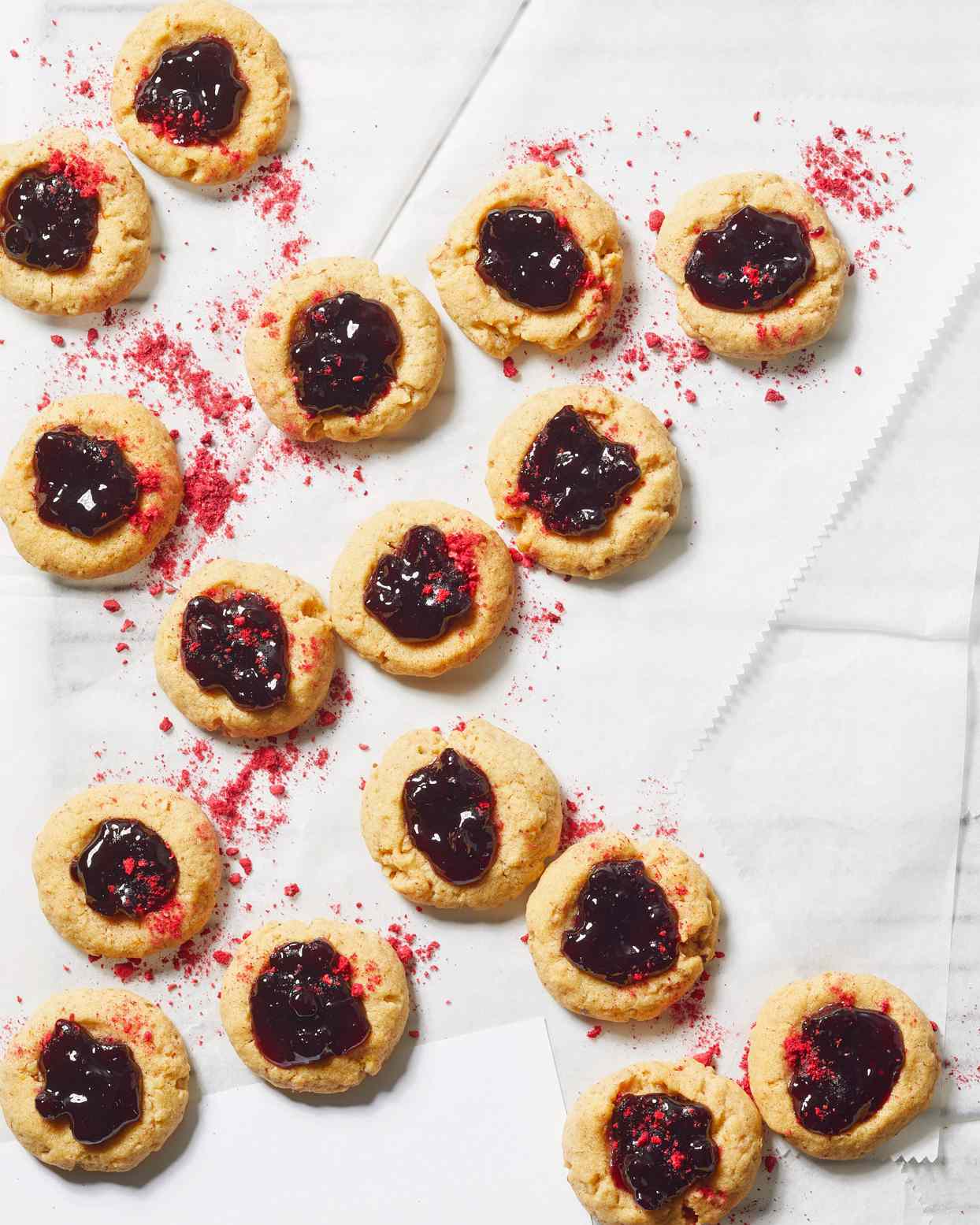 Huckleberry Jam Thumbprint Cookies dusted with crushed freeze-dried raspberries