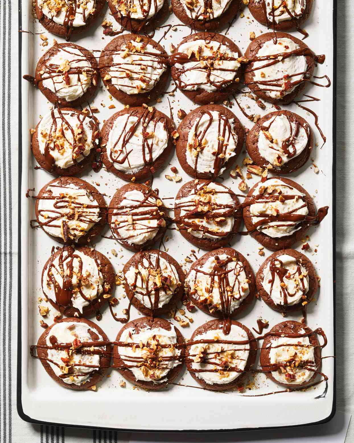 Mississippi Mud chocolate cookies topped with marshmallows and chocolate drizzle