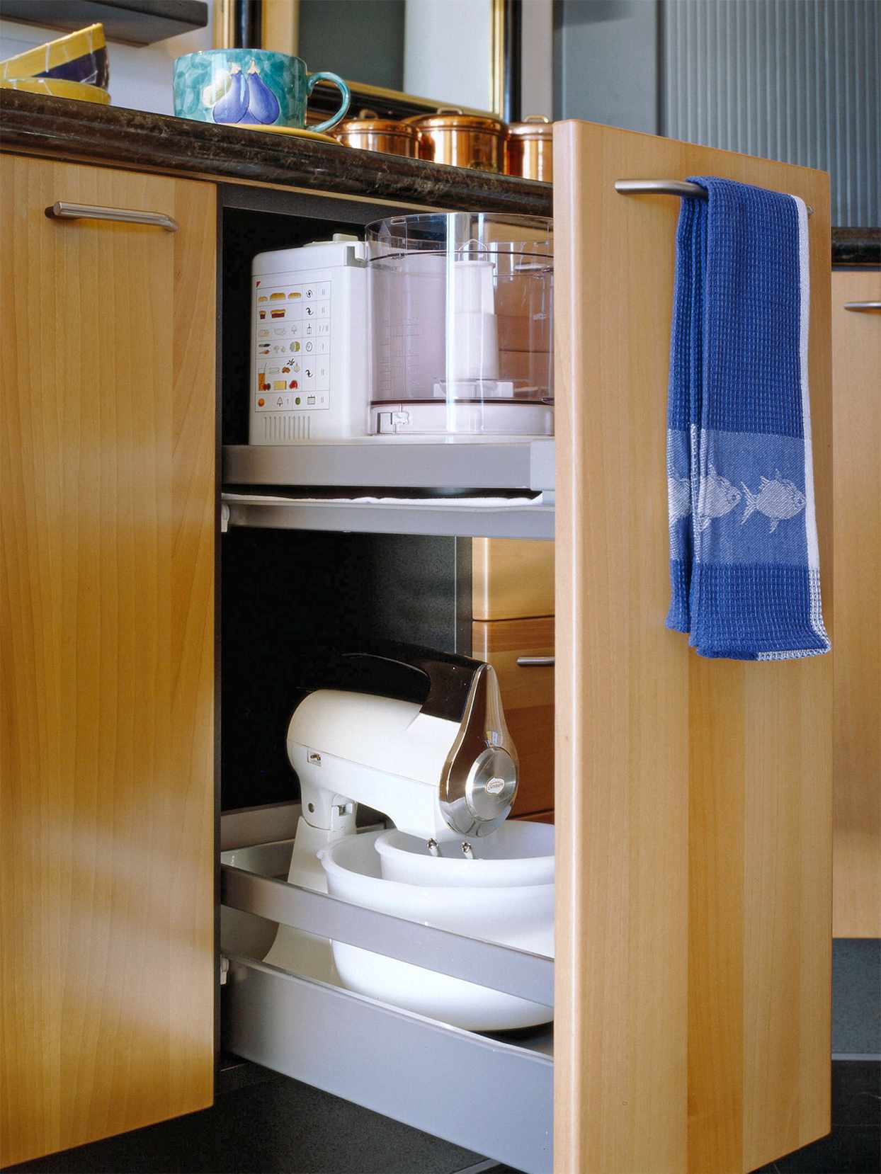 kitchen slide-out storage mixer blonde wood blue towel