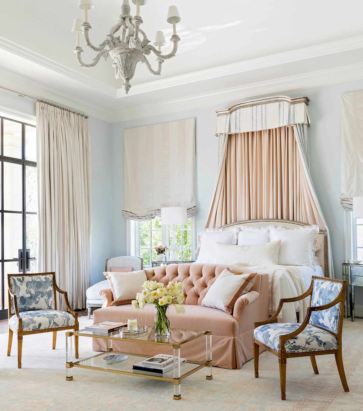 french-inspired master bedroom soft blue pale pink sofa table