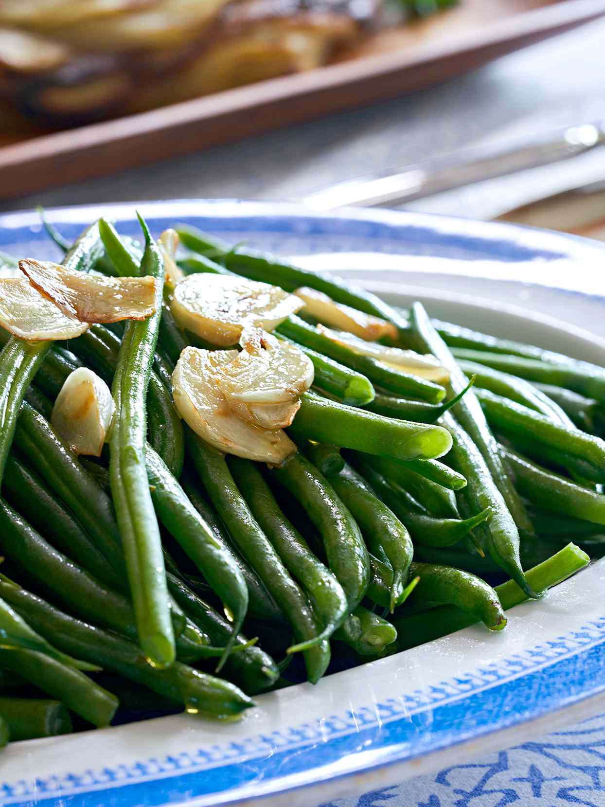 garlic green beans blue white dish detail