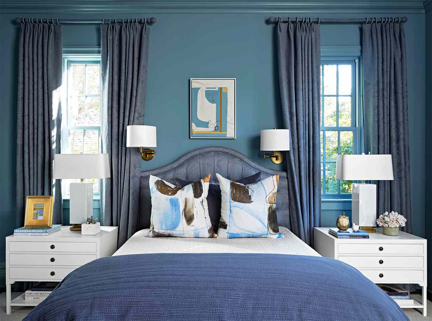 traditional symmetrical bedroom shades blue white