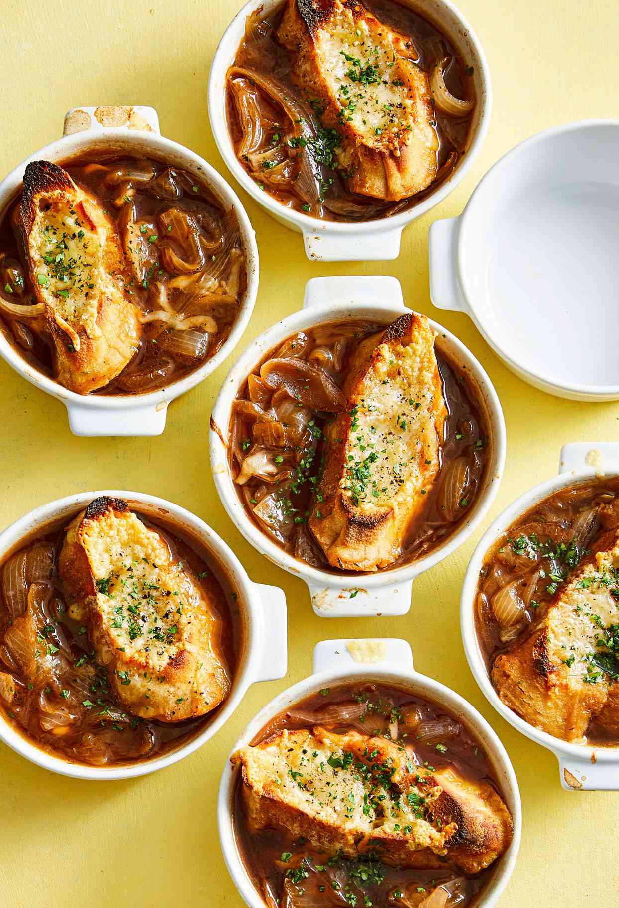 small crocks with French onion soup and toast
