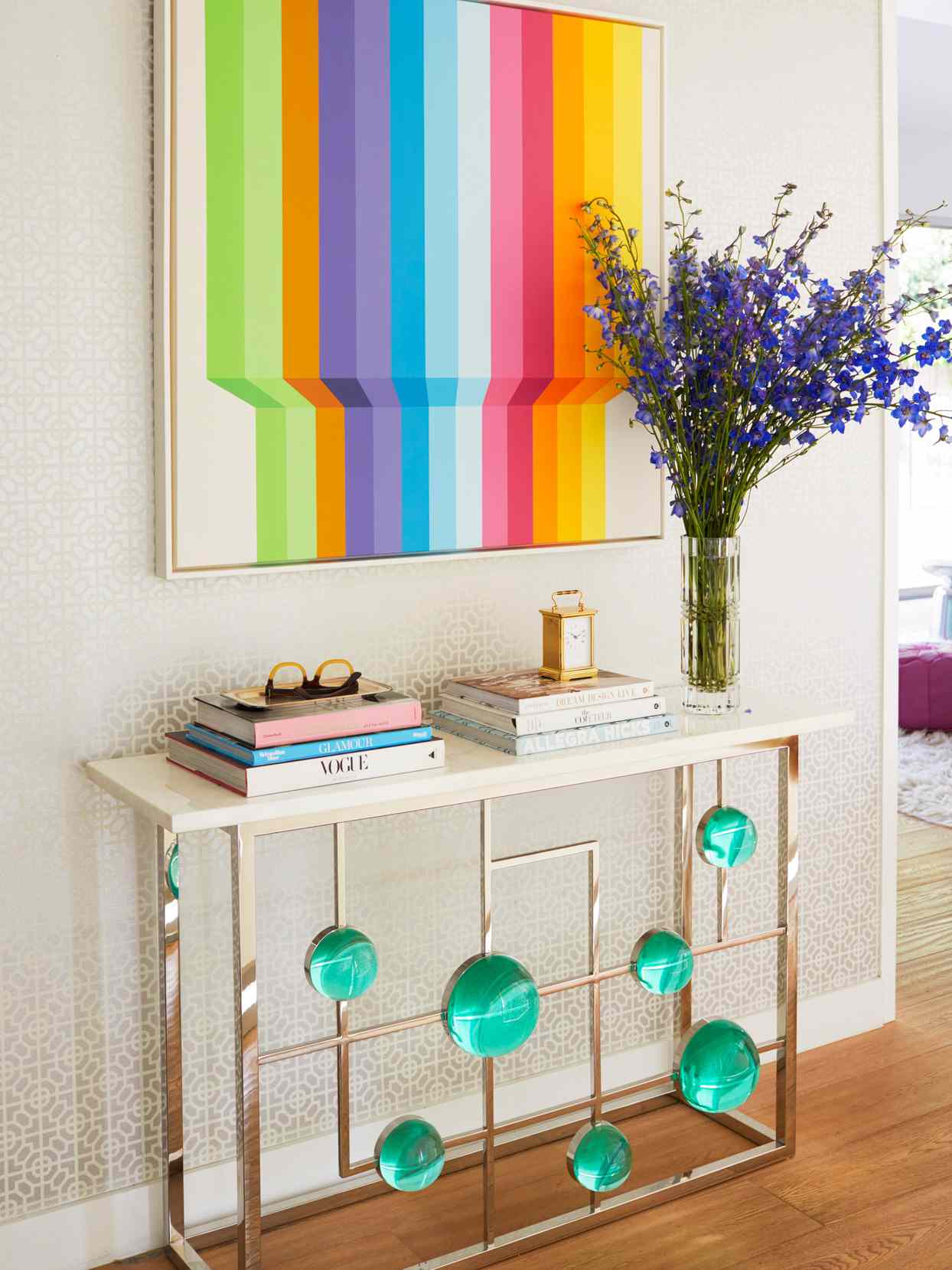 graphic colorful artwork in hallway above table