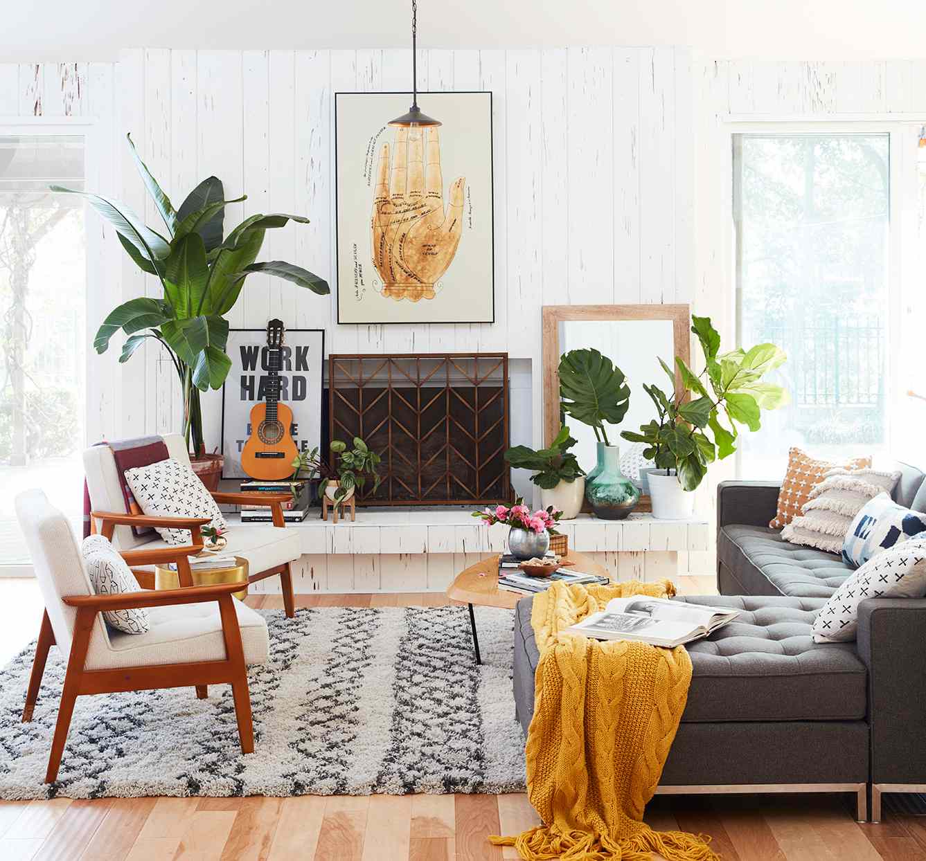 eclectic living room with natural light and plants