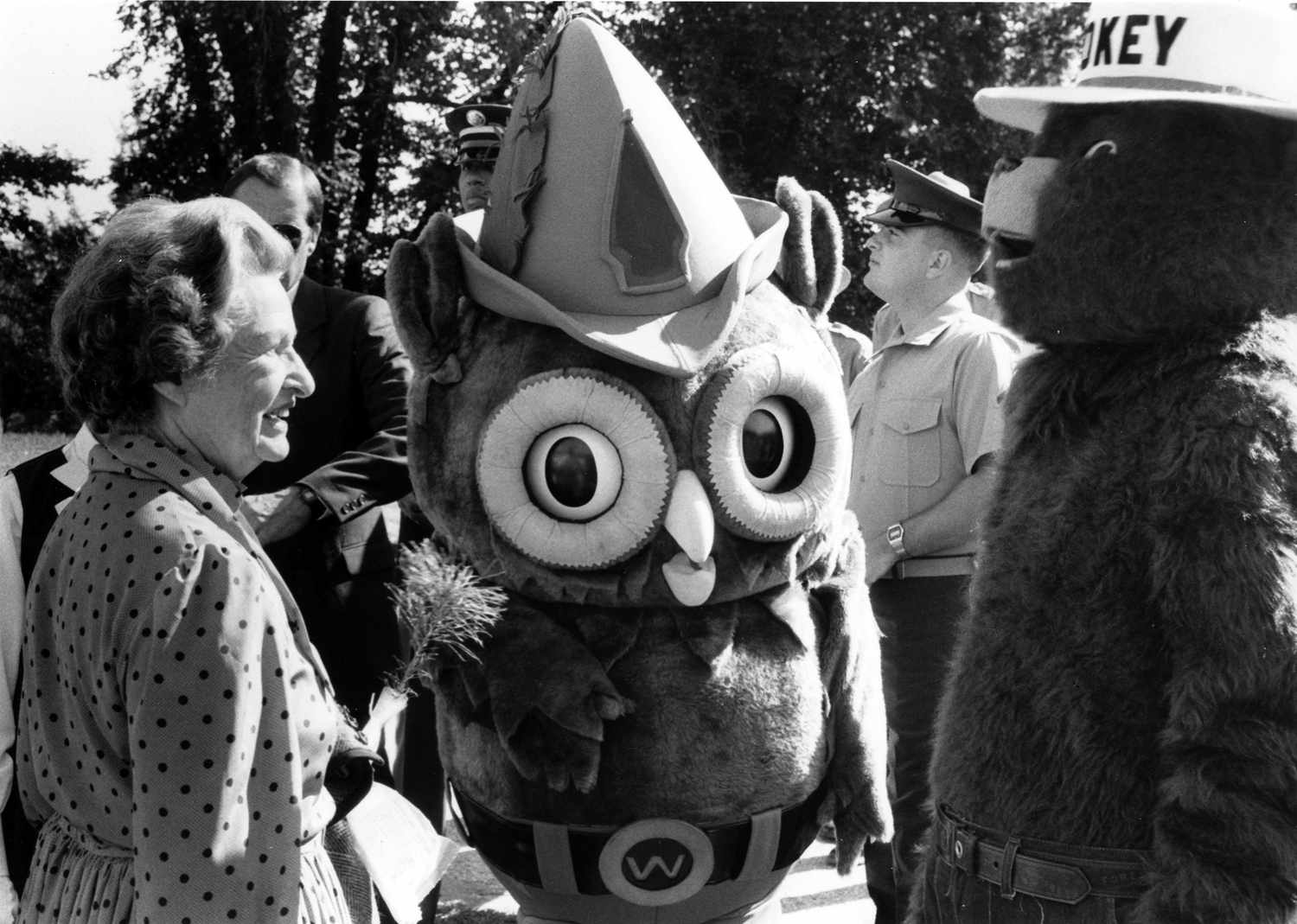 photo of Lady Bird Johnson with Woodsy Owl and Smokey the Bear circa 1970