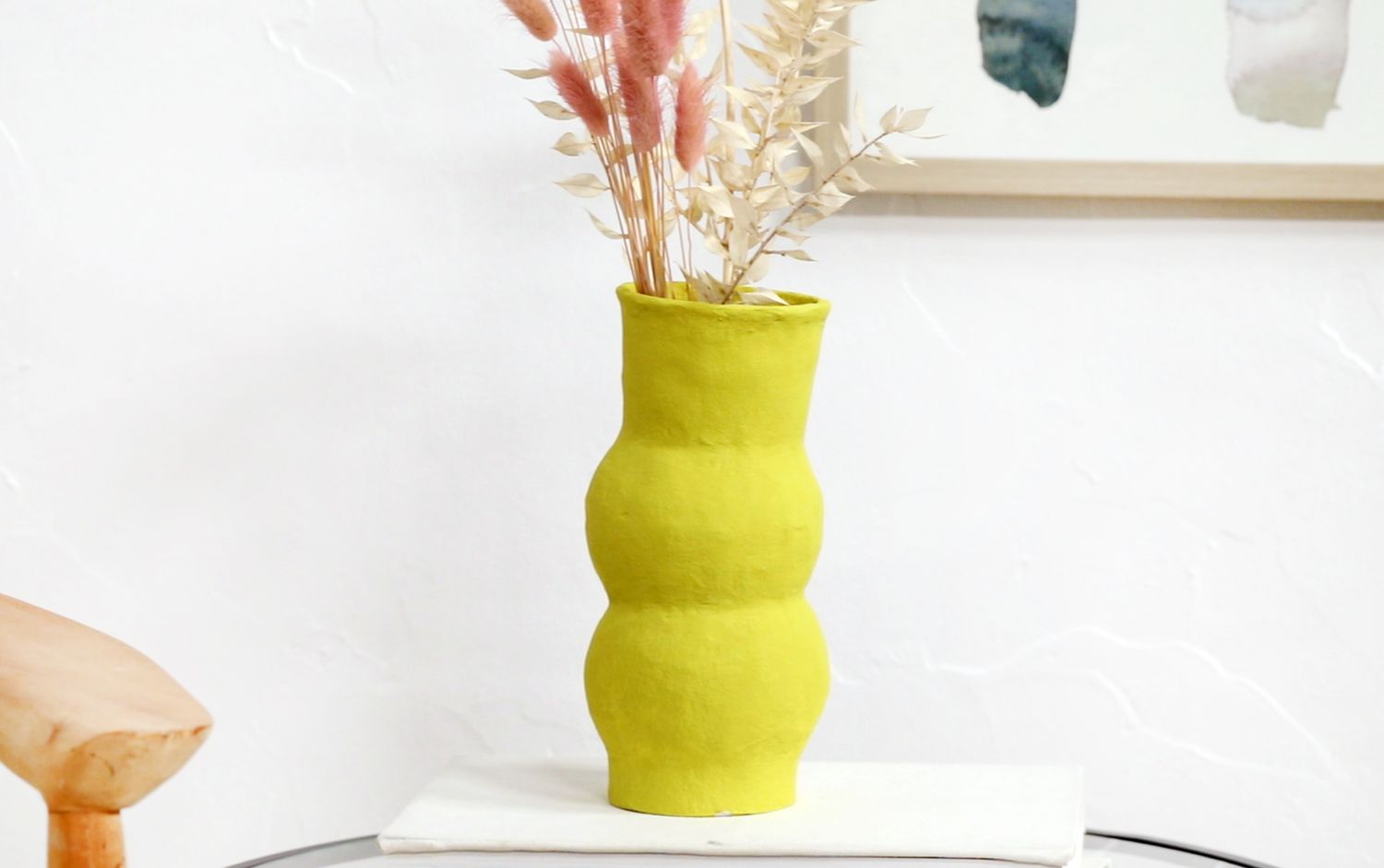 papier mache yellow vase on table