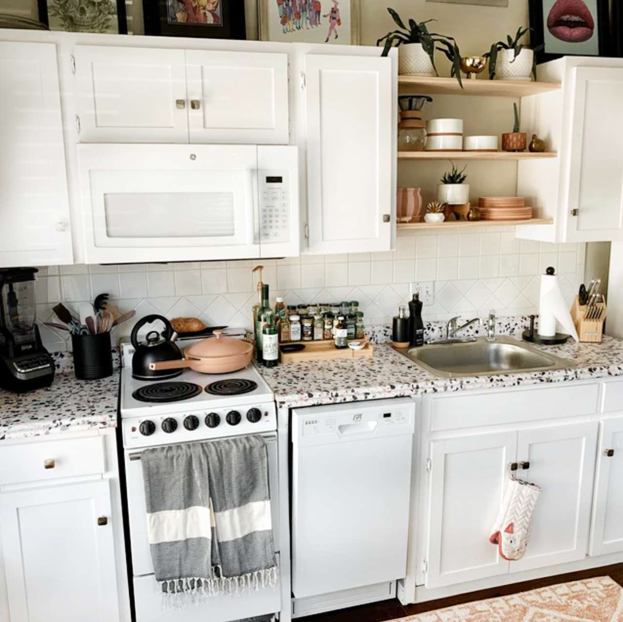 Countertops with terrazzo patterned adhesive paper