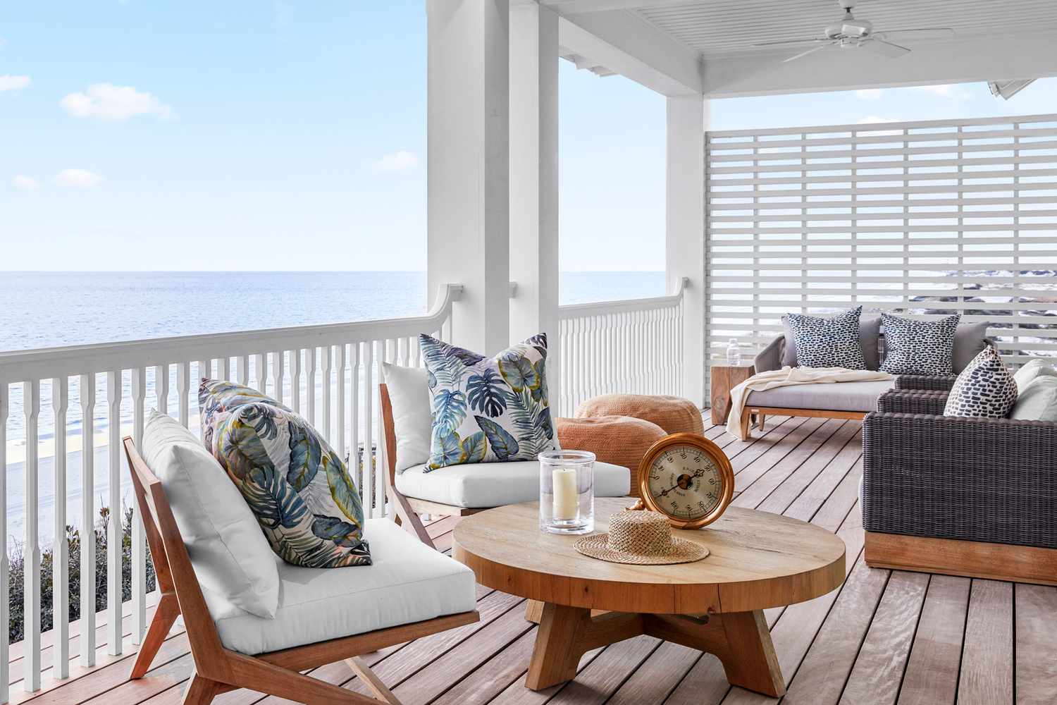 beachside deck with loungy outdoor furnishings
