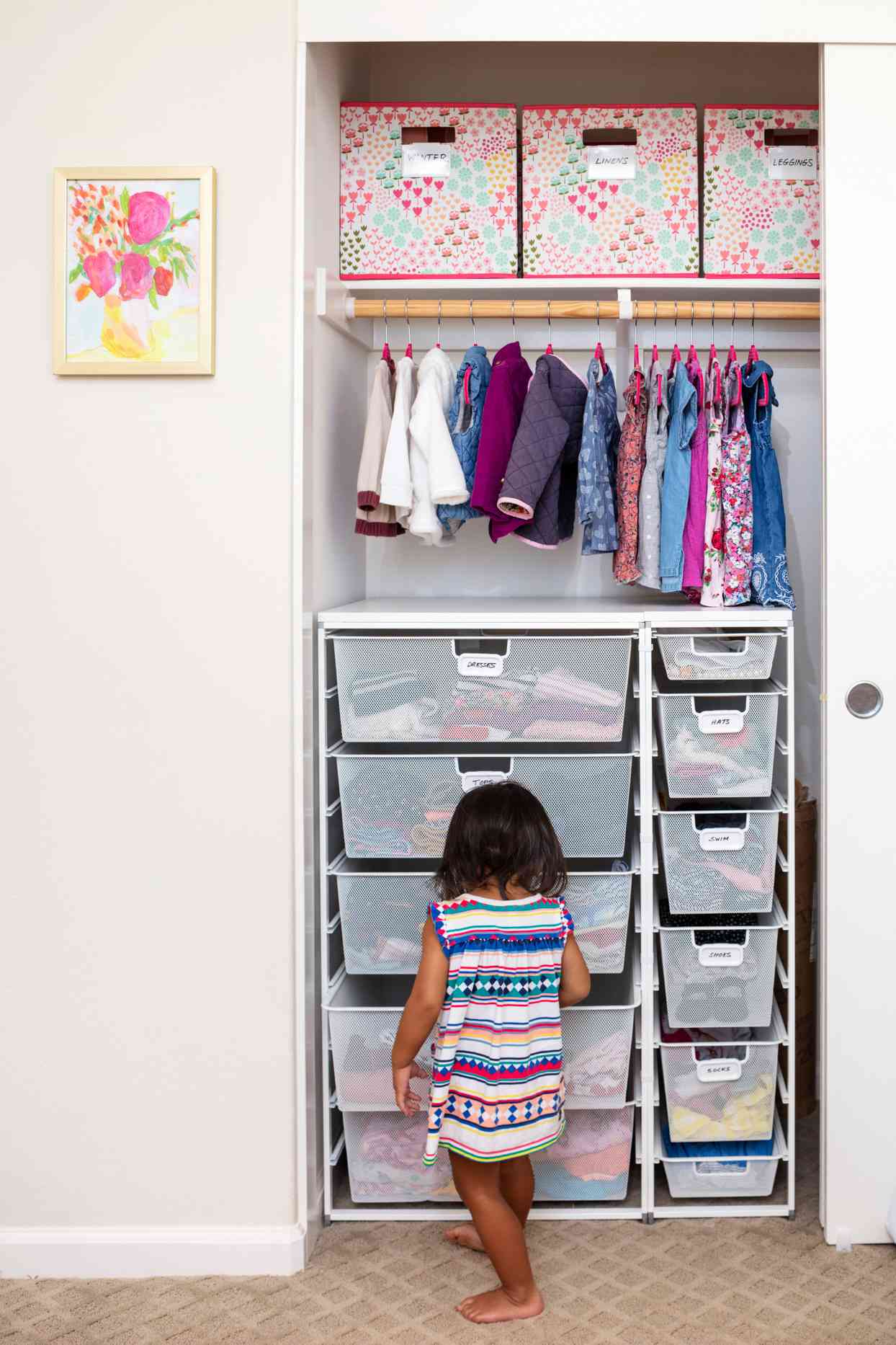 kid closet storage with storage bins and pull out baskets