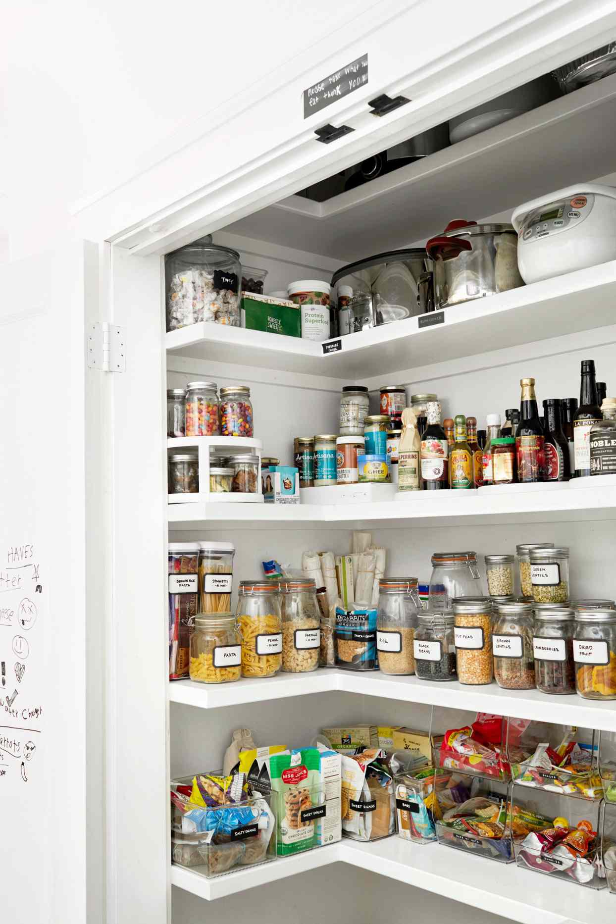 pantry with labeled food storage containers