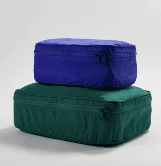 blue and green packing cubes