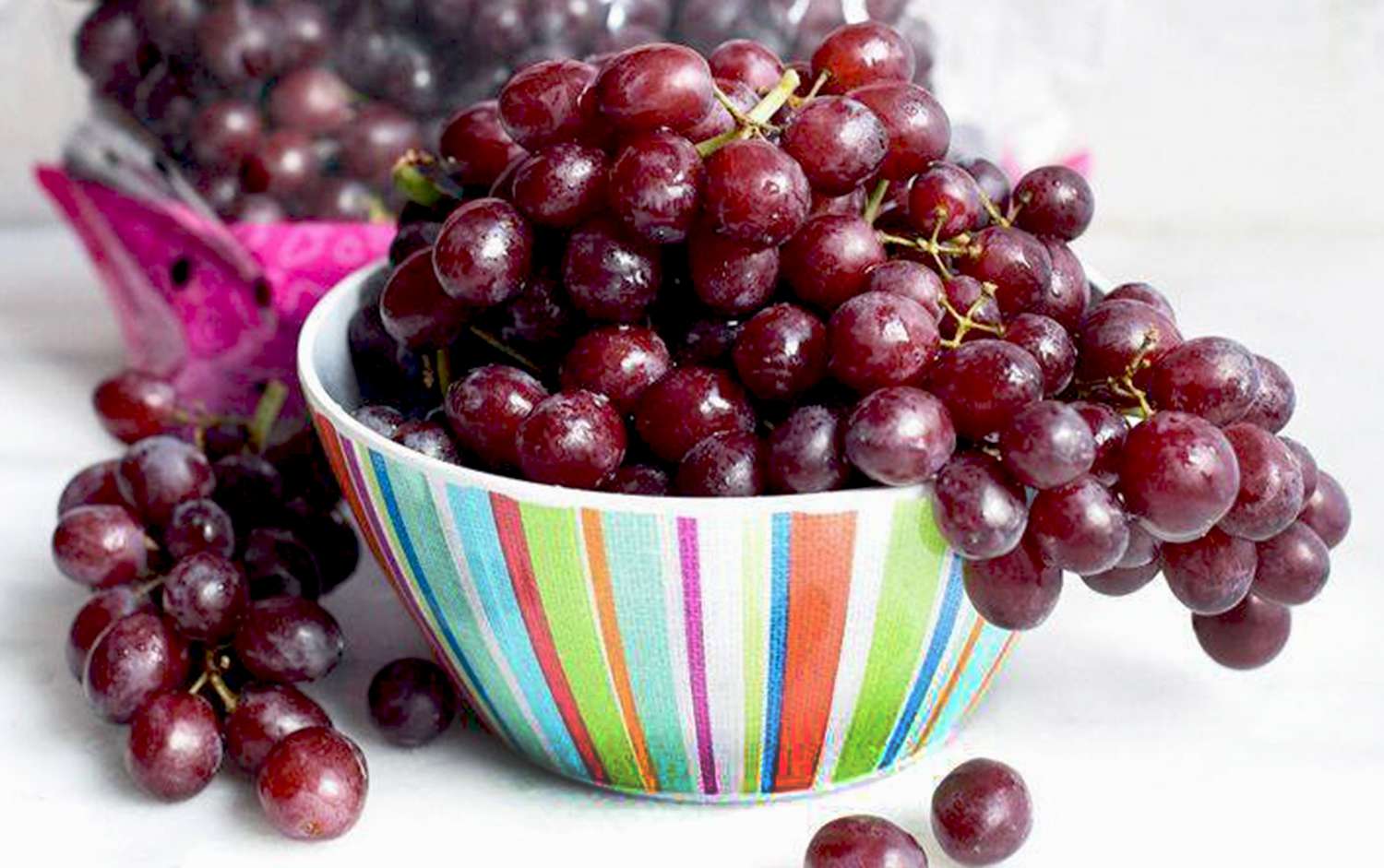 A bowl of gummy berry grapes