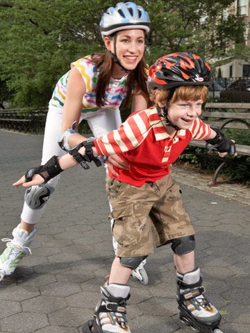 Mother and son rollerblading