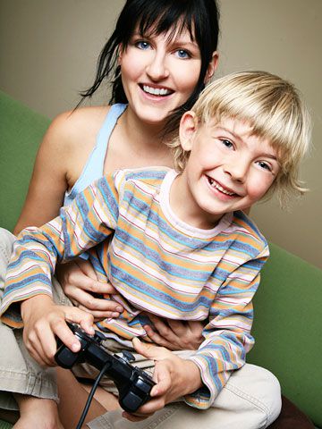 mom and child playing video game