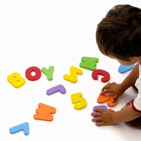 boy playing with letters
