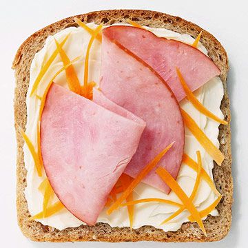 The Laughing Cow light spreadable cheese with ham and grated carrot