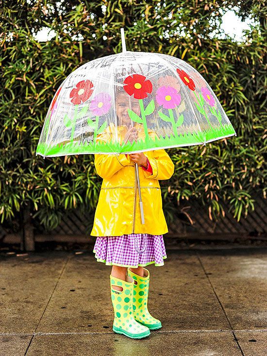 Girl standing under flower umbrella