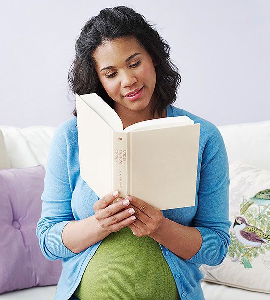 pregnant woman reading book