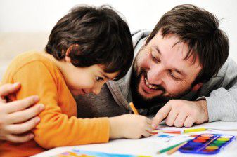 dad coloring with son