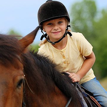 child horseback riding
