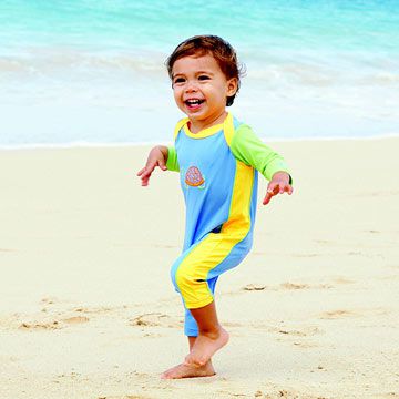 toddler running on beach