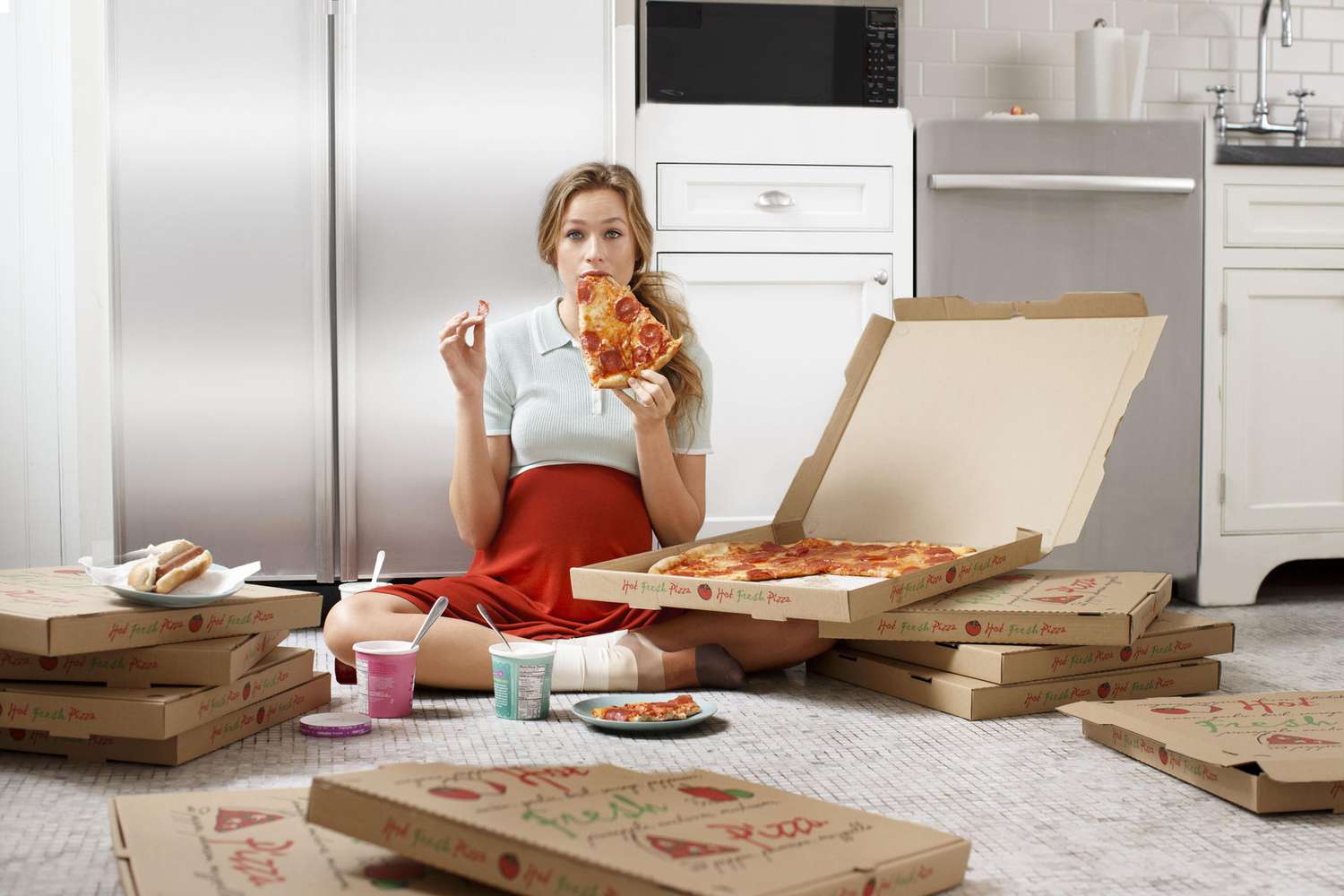 Pregnant Woman Eating Pizza Cropped