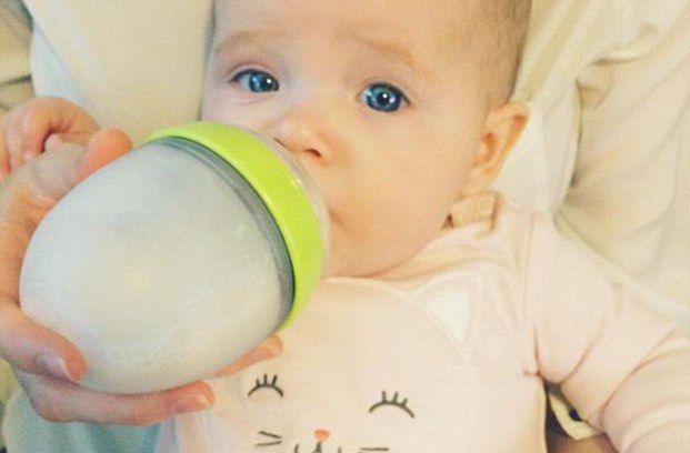 Coco Rocha's baby daughter with bottle