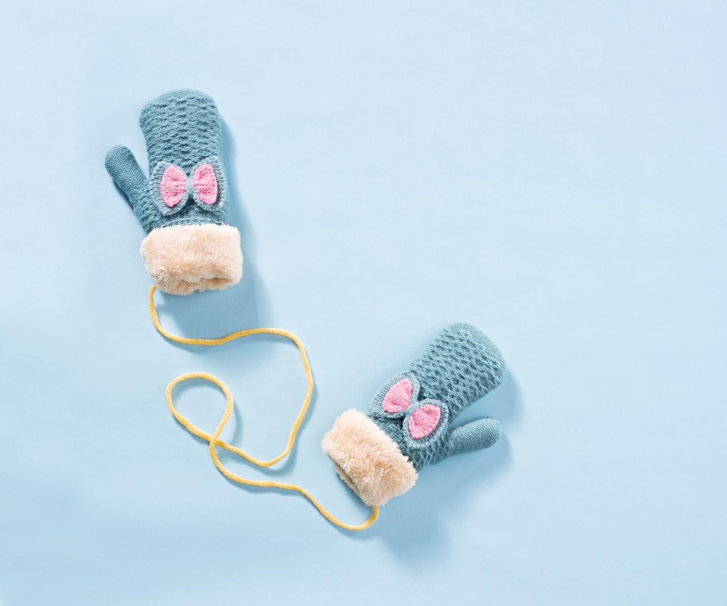 Snow Mittens with Blue Background