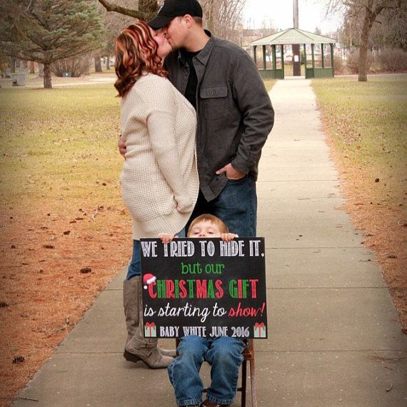 holiday sign pregnancy announcement