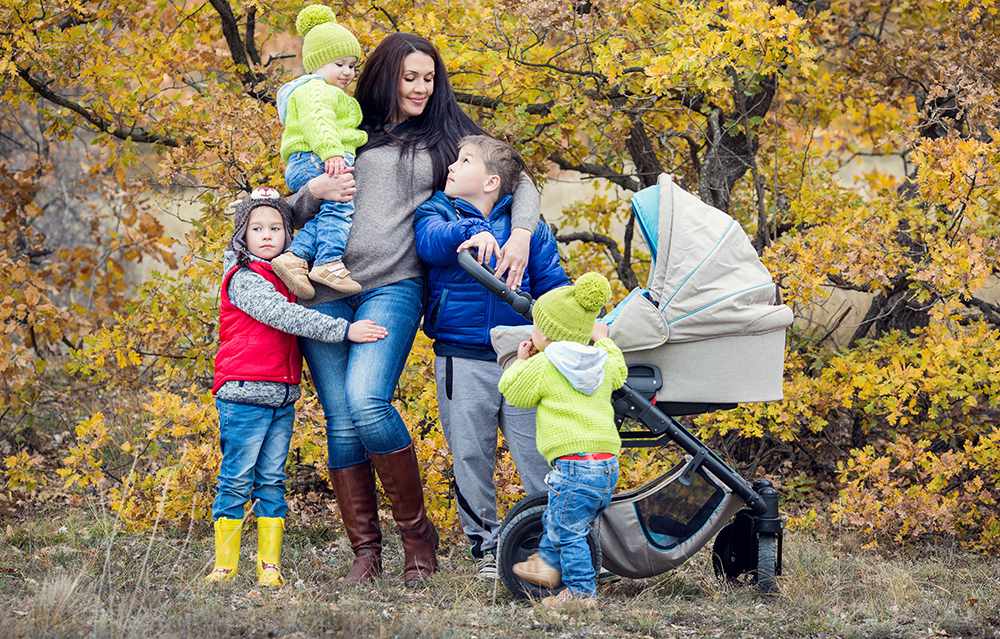 mom with four kids outdoors