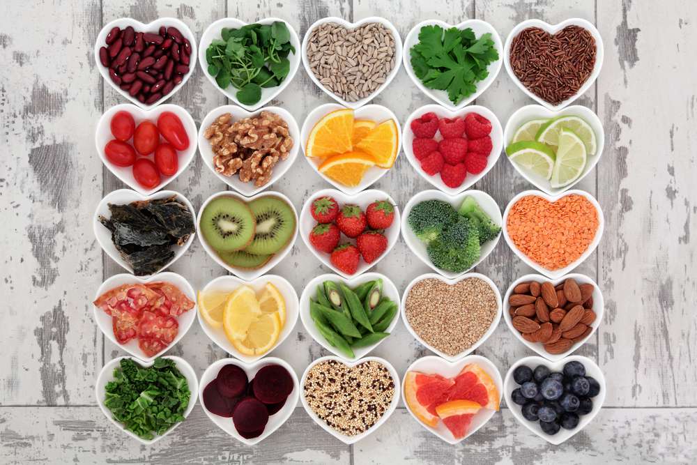Healthy foods in heart-shaped containers