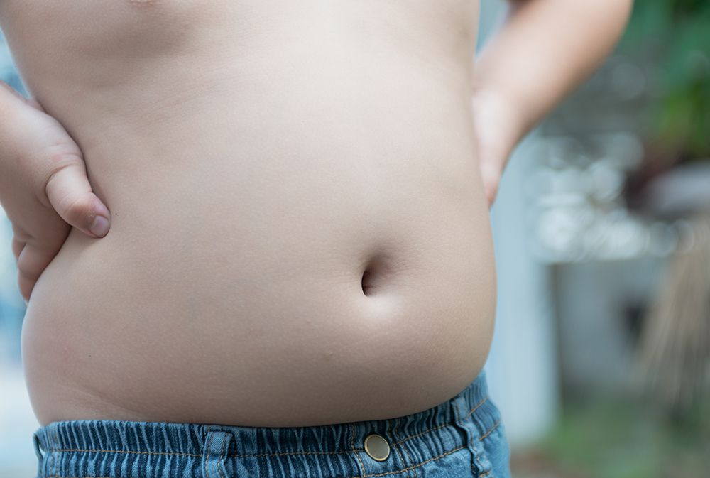 stomach of overweight child
