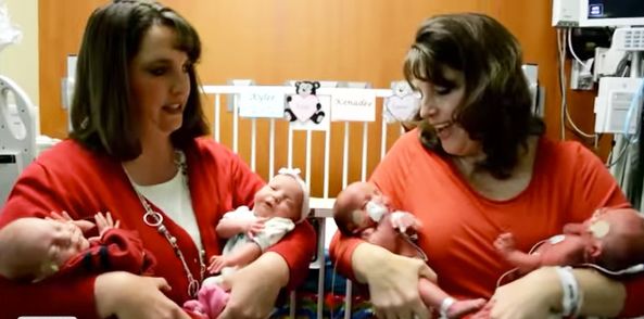 twin sisters with twin babies