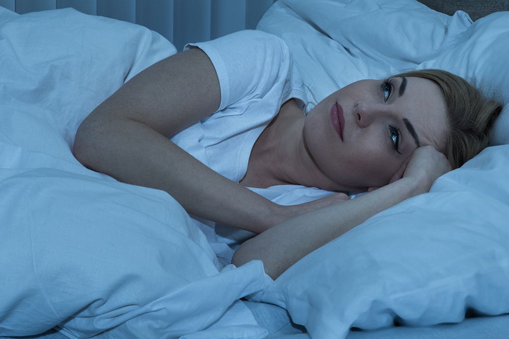 woman having trouble sleeping