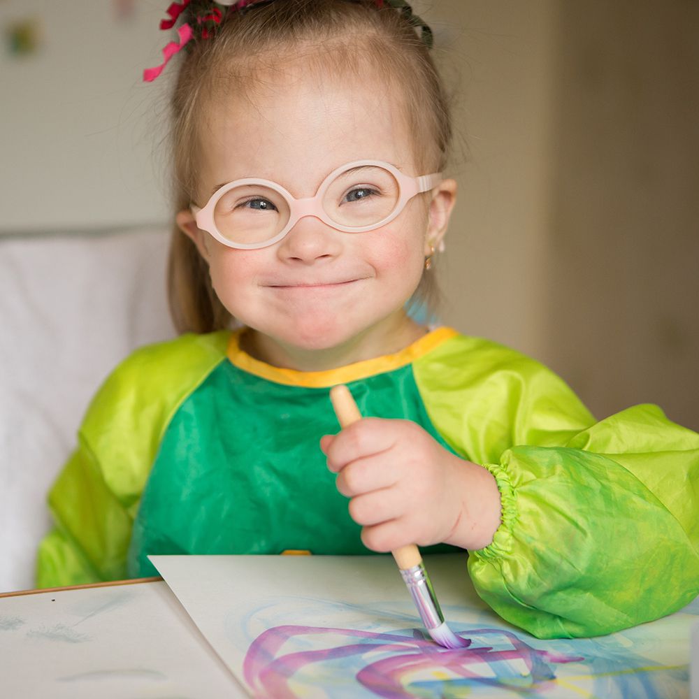 girl-down-syndrome-glasses-painting.jpg