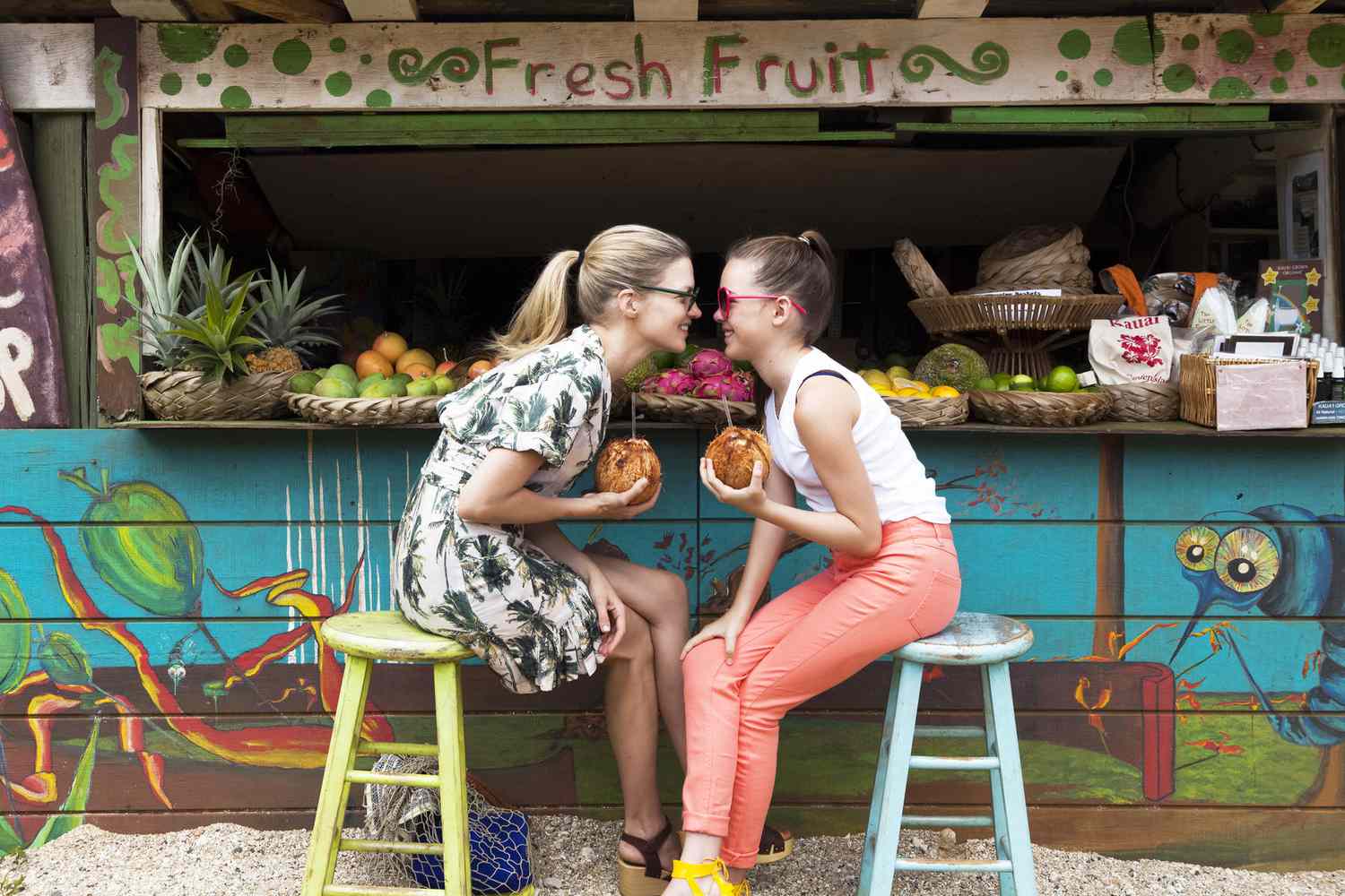Mom and Daughter at Fruit Stand on Vacation