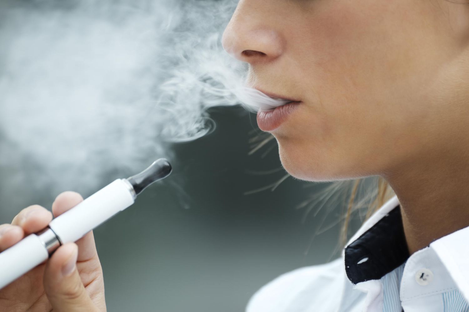 Young Person Smoking Electronic Cigarette