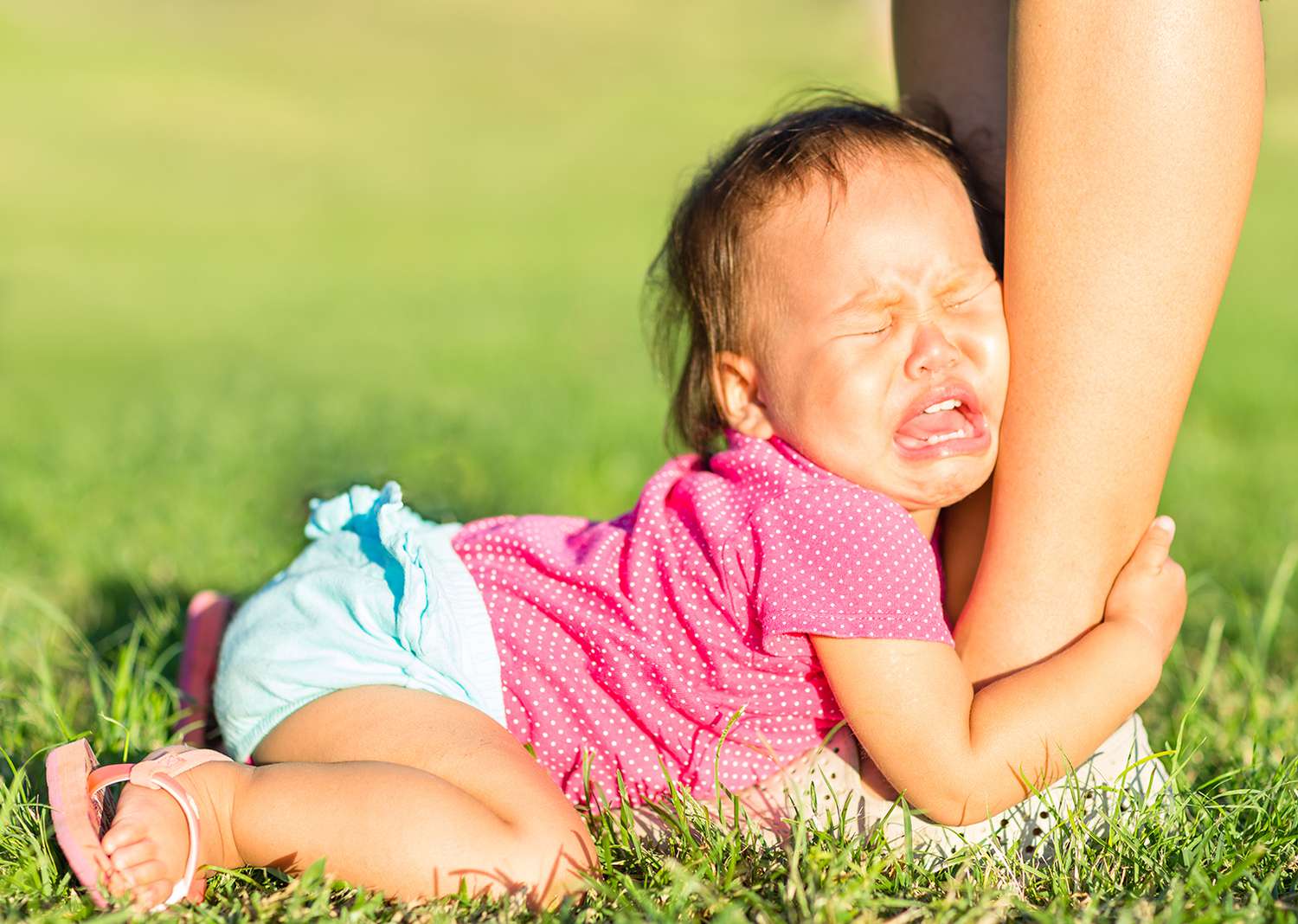 Baby Crying While Holding Moms Leg