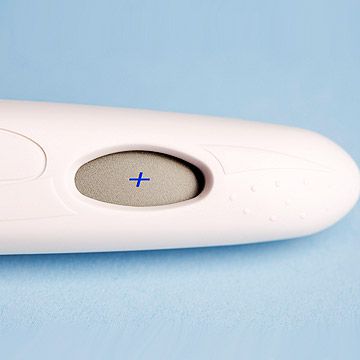 close up of positive pregnancy test
